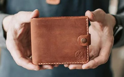 Leather wallet with his initials